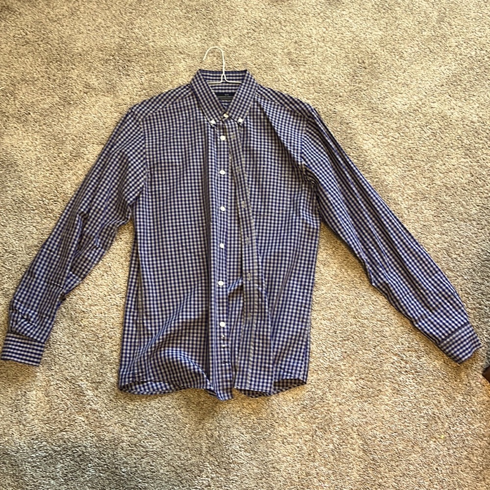 Combatant Gentleman - blue and grey checkered shirt.